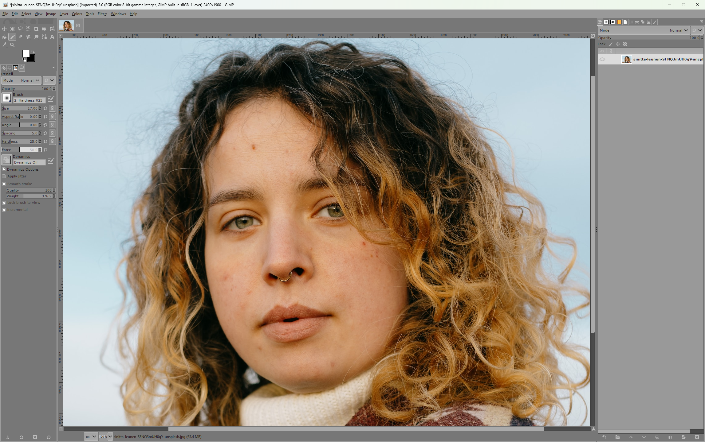 GIMP Photo Editor - A Picture of a woman with some blemishes on her skin.